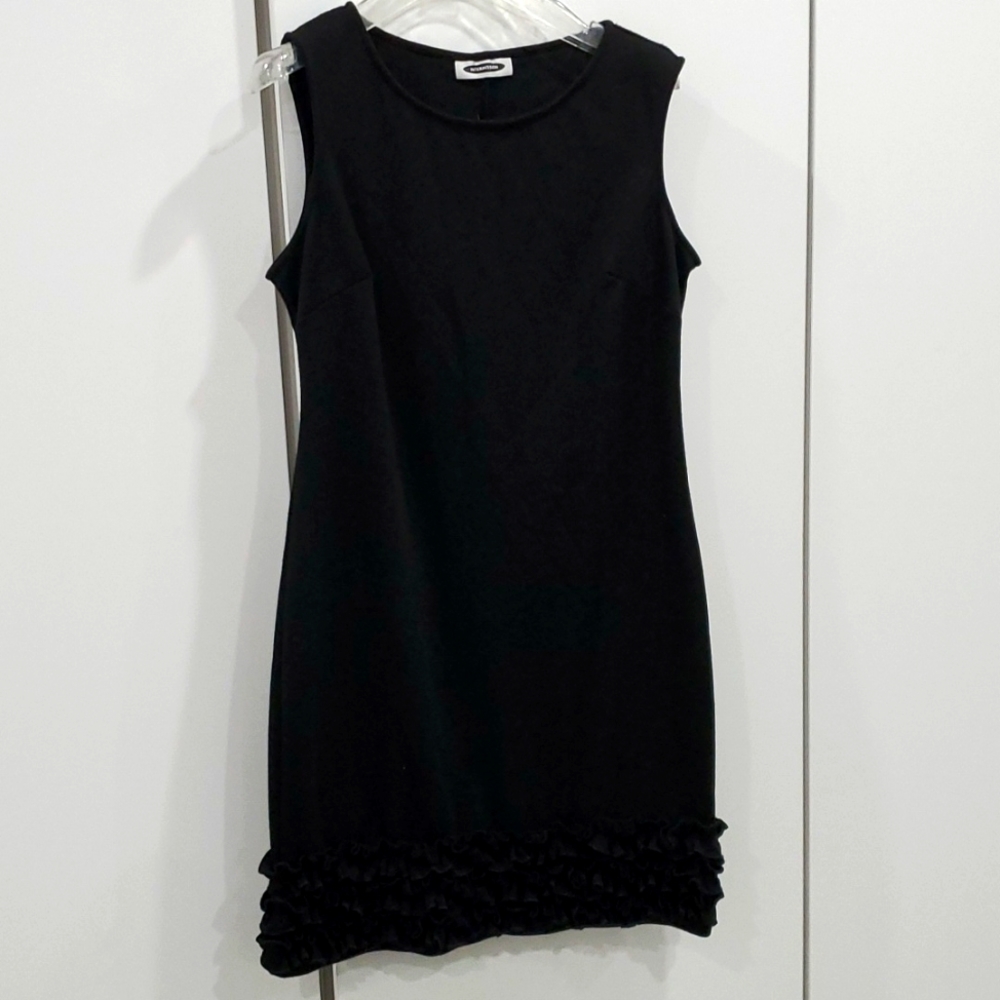 Stretchy black dress, ruffles at the bottom.  Medium to large Dw2